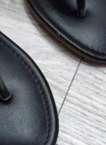 Wearing flip flops with a flat bottom on the outside E1330