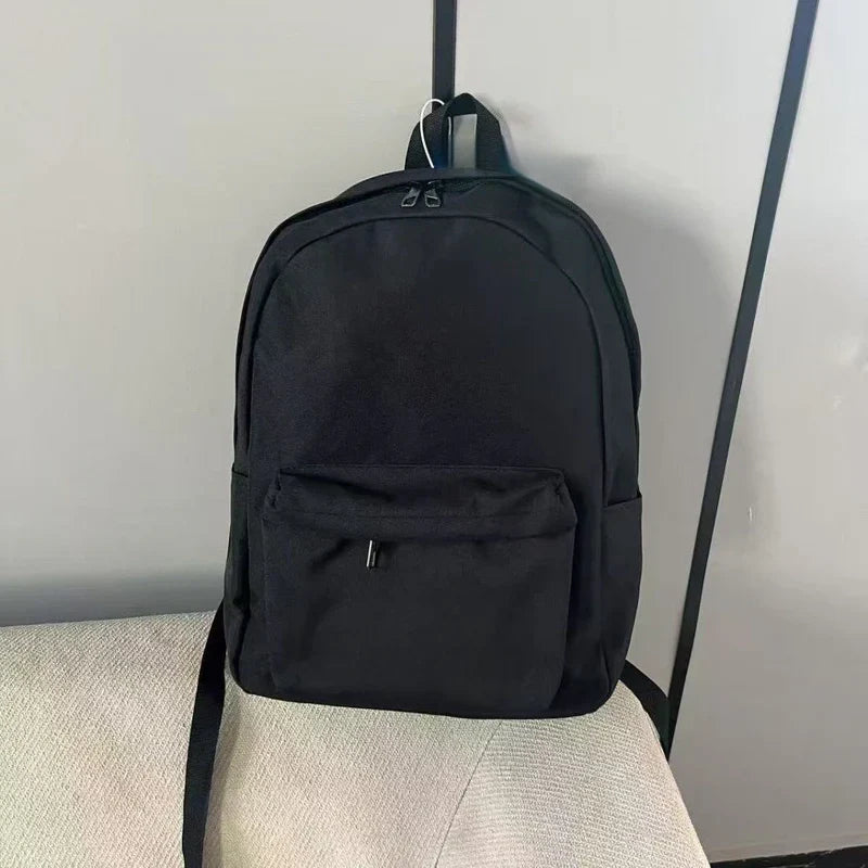 Simple solid color large capacity backpack  E1315