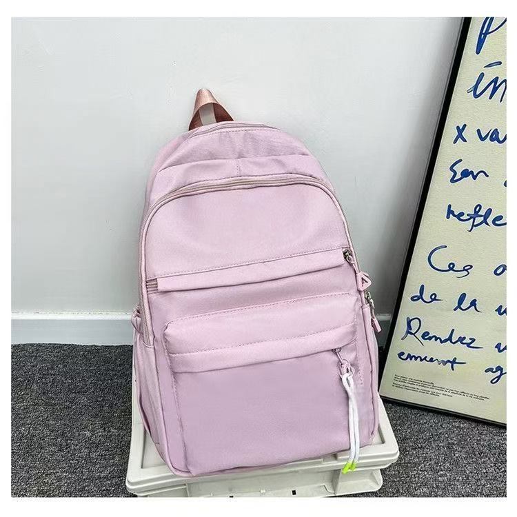 Minimally designed solid color backpack for both shoulders E1305